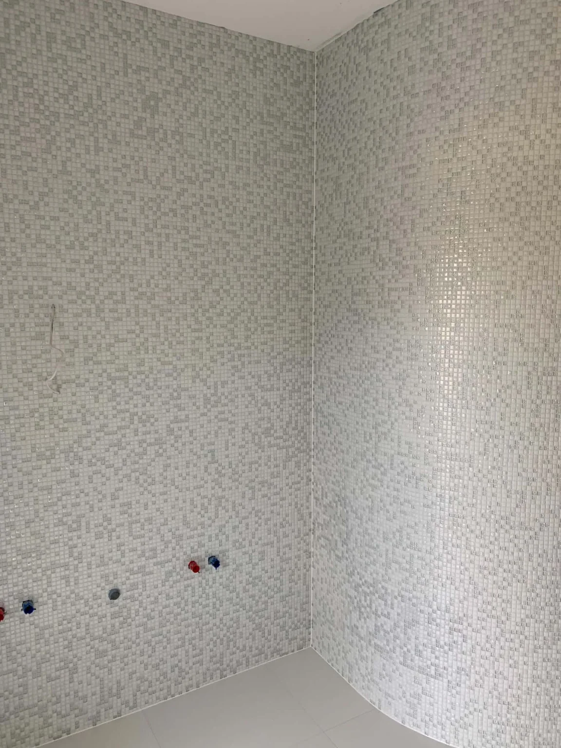 Real light mosaic around corners from our tiling work portfolio