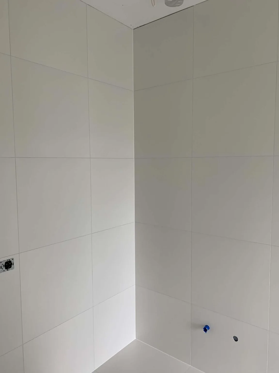 Real light large-format wall tiles from our tiling work portfolio