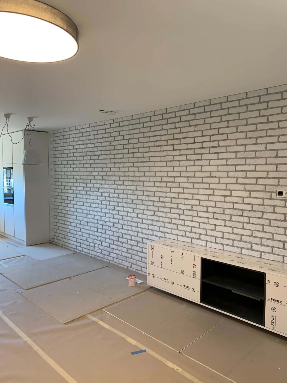 Real light tiled floor with mosaic walls from our tiling work portfolio