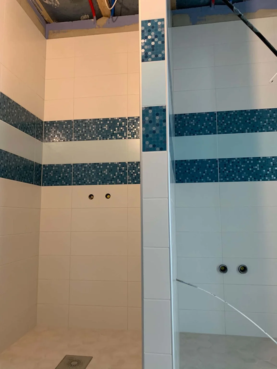 Real blue mosaic bands from our tiling work portfolio